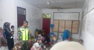 Babinsa Koramil 01/Sukajaya, Laksanakan Pendampingan Posyandu Balita di Gampong Cot Abeuk