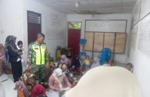 Babinsa Koramil 01/Sukajaya, Laksanakan Pendampingan Posyandu Balita di Gampong Cot Abeuk