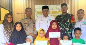Babinsa Koramil 01 Sukajaya Dampingi Kegiatan Pemberian Santunan Anak Yatim dan Disabilitas di Gampong Anoi Itam