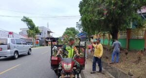 Babinsa 09 Koramil,01/Sukajaya Ajak Warga Gotong Royong Bersihkan Parit, Cegah DBD dan Bangkitkan Semangat Kebersamaan