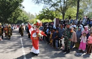 Babinsa Koramil 02/Sukakarya Kawal Pawai Karnaval HUT RI ke-80 di Kota Sabang