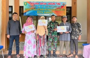 Babinsa Koramil 02/Sukakarya Monitor Penyaluran BLT-DD untuk Perkuat Kesejahteraan Warga di Gampong Binaannya