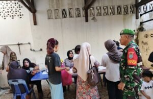 Babinsa Koramil 02/Sukakarya Dampingi Posyandu, Perkuat Upaya Pencegahan Stunting