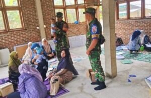 Babinsa Koramil 02/Sukakarya Perkuat Sinergi dalam Monitoring Kegiatan Posyandu