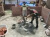 Tak Canggung Kotor! Babinsa Koramil 02/Sukakarya Ini Ikut Ngaduk Semen Bersama Warga
