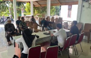 Babinsa Jaboi Hadiri RAT BUMG, Dorong Transparansi dan Kemajuan Ekonomi Warga