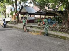Babinsa Kuta Barat Bantu Warga Bersihkan Jalan, Wujud Nyata Kepedulian TNI kepada Masyarakat