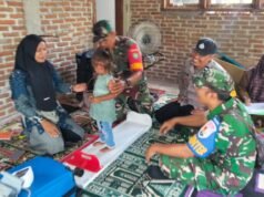 Dampingi Posyandu, Babinsa dan Bhabinkamtibmas Ingatkan Pentingnya Pantau Tumbuh Kembang Balita