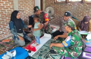Dampingi Posyandu, Babinsa dan Bhabinkamtibmas Ingatkan Pentingnya Pantau Tumbuh Kembang Balita