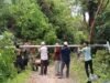 Semangat Kebersamaan, Babinsa Koramil 01/Sukajaya dan Warga Gotong Royong Pasang Lampu Penerangan Jalan di Gampong Jaboi