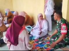 Dukung Kesehatan Ibu dan Anak, Babinsa Krueng Raya Dampingi Kegiatan Posyandu