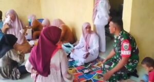 Dukung Kesehatan Ibu dan Anak, Babinsa Krueng Raya Dampingi Kegiatan Posyandu