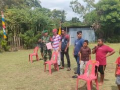 Meriahkan HUT RI ke-81, Babinsa Kuta Ateuh Turun Langsung Bantu Warga Gelar Perlombaan di Lapangan Jurong Nawawi