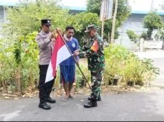 Sambut HUT RI ke-81, Babinsa & Bhabinkamtibmas Bersama Warga Kuta Timu Hiasi Gampong dengan Bendera Merah Putih