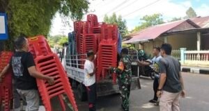 Semangat Kebersamaan: Babinsa Kuta Timu Bantu Warga Siapkan Pesta Pernikahan