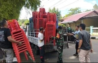 Semangat Kebersamaan: Babinsa Kuta Timu Bantu Warga Siapkan Pesta Pernikahan