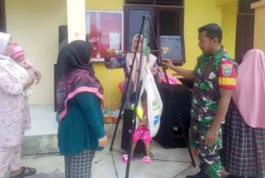 Babinsa Paya Pantau Kegiatan Posyandu, Pastikan Pelayanan Kesehatan Warga Berjalan Optimal
